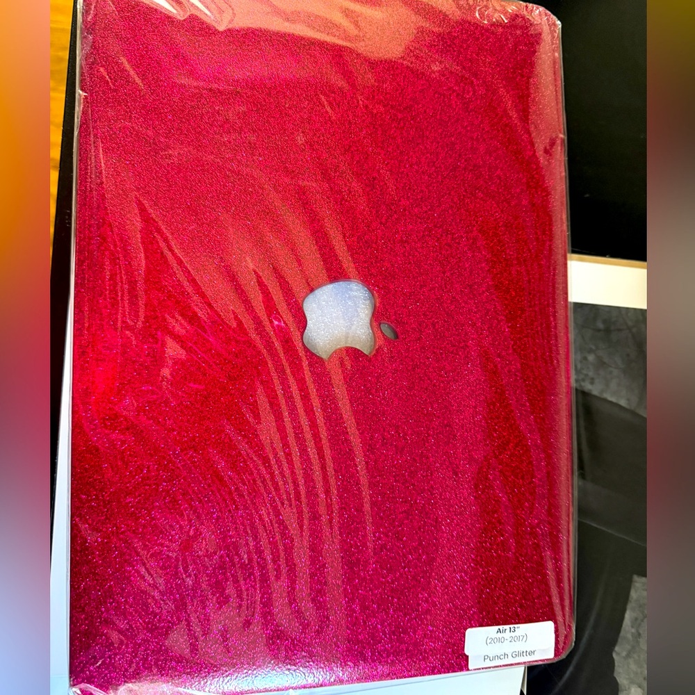 Brand new in chic geek MacBook case. 2010-2017 size.